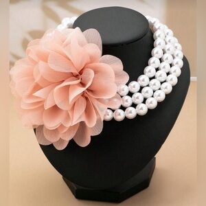 Elegant Pearl Necklace with Pink Flower Accent